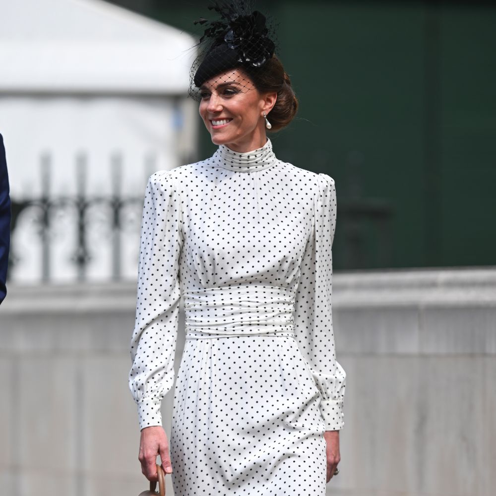 Kate Middleton wears a polka dot dress.