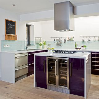 kitchen area with purple counter and wooden floor