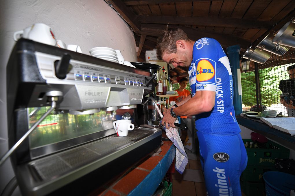 Kasper Asgreen makes an espresso before the Deceuninck-QuickStep training ride