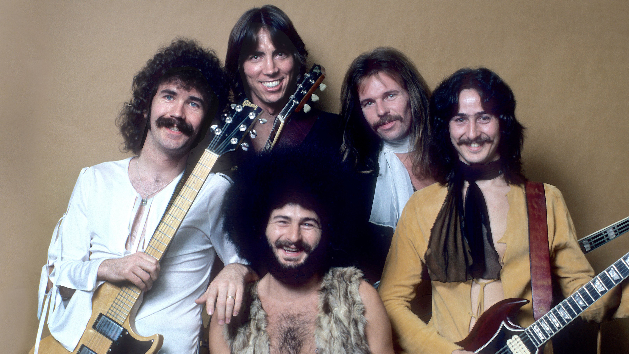 BOSTON (l-r) Brad Delp, Tom Scholz, Sib Hashian, Fran Sheehan, Barry Goudreau pose for a portrait backstage at the Providence RI Civic Center on October 7, 1976 in Providence, Rhode Island.