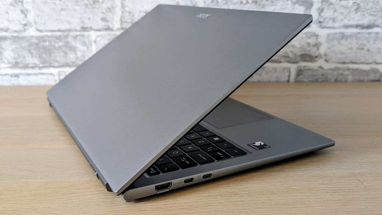 The Acer Aspire Go on the ITPro background