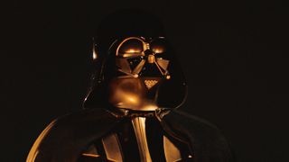 Darth Vader (played by Hayden Christiansen) in Obi-Wan Kenobi, looking into fire