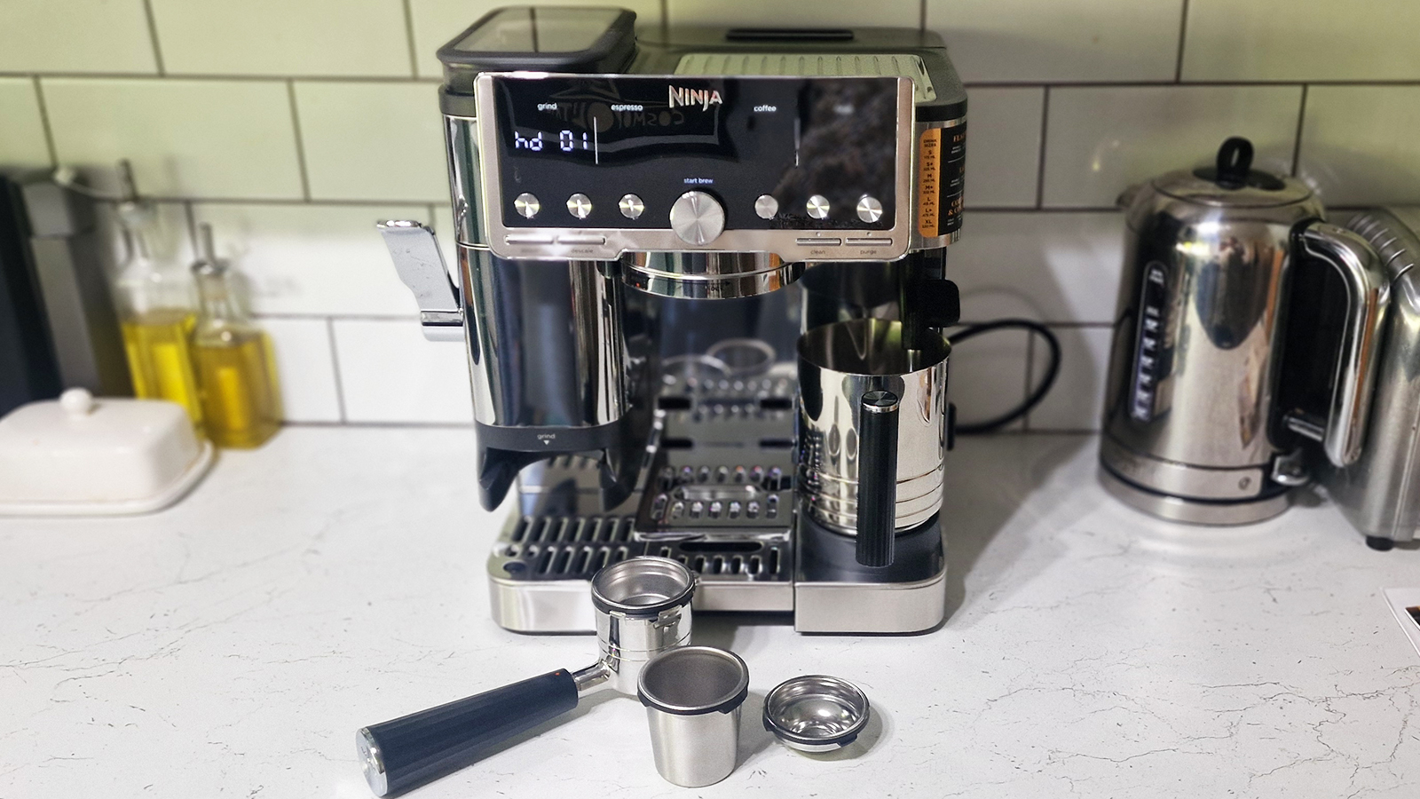 Ninja Luxe Café Pro being tested in a green and white kitchen