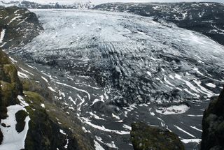 Solheimajokull Glacier in Iceland can be seen in this 2007 image. The glacier is located on the southern edge of the Myrdalsjokull ice cap. See what the glacier looks like now.