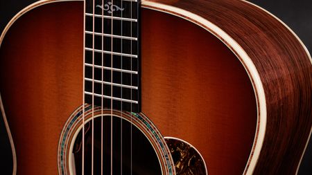 A cropped photo showing Taylor's 814e SB Super Auditorium acoustic guitar