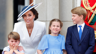 Prince Louis of Cambridge, Catherine, Duchess of Cambridge, Princess Charlotte of Cambridge and Prince George of Cambridge watch a flypast from the balcony of Buckingham Palace during Trooping the Colour on June 2, 2022 in London, England