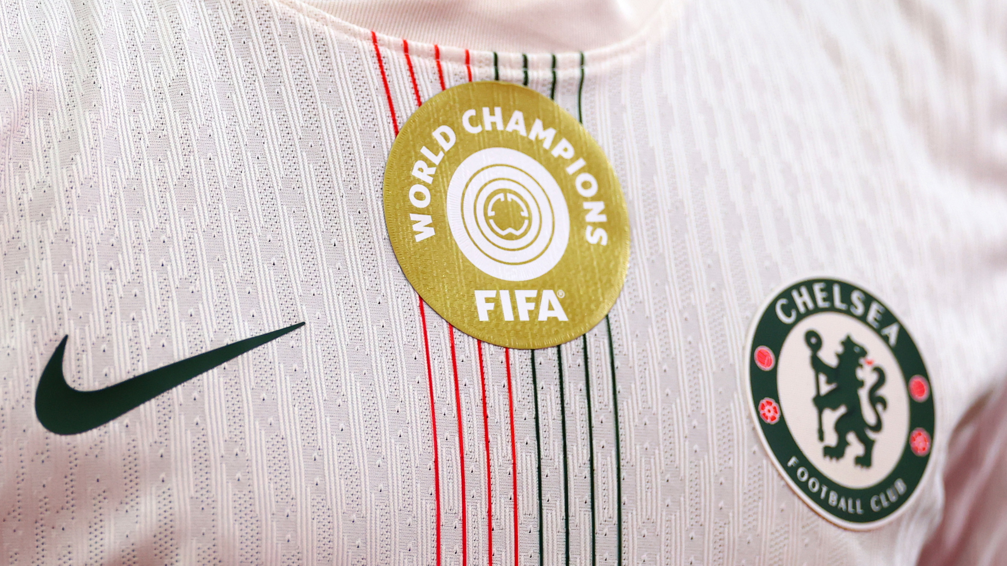 A close-up view of Chelsea's kit featuring the Club World Cup badge