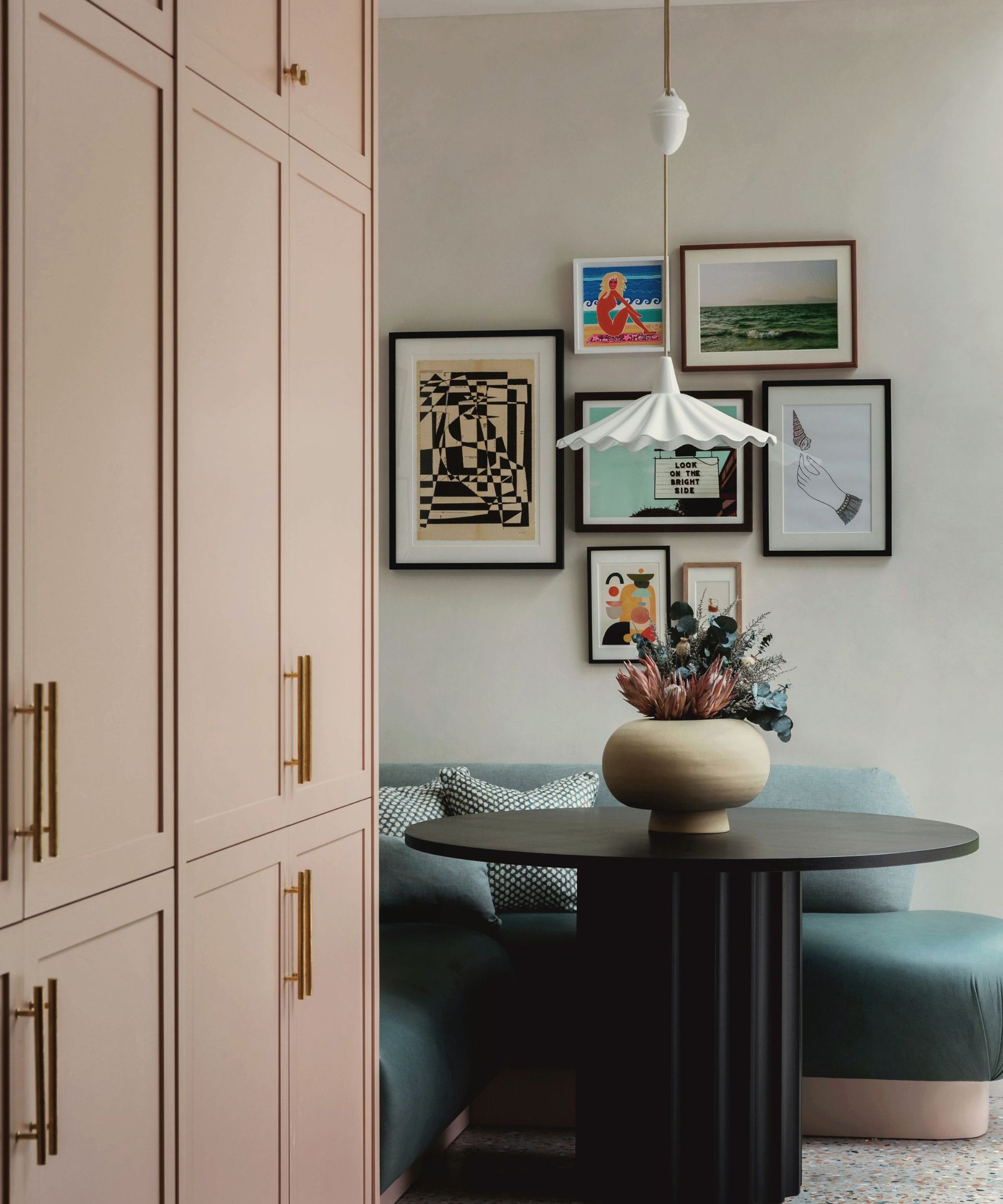 dining nook in corner with plush banquette