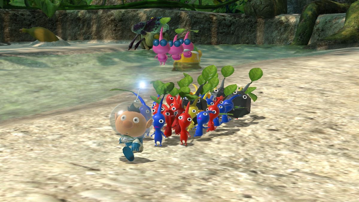 Pikmin 3 Deluxe screenshot of player being followed by a selection of Pikmin