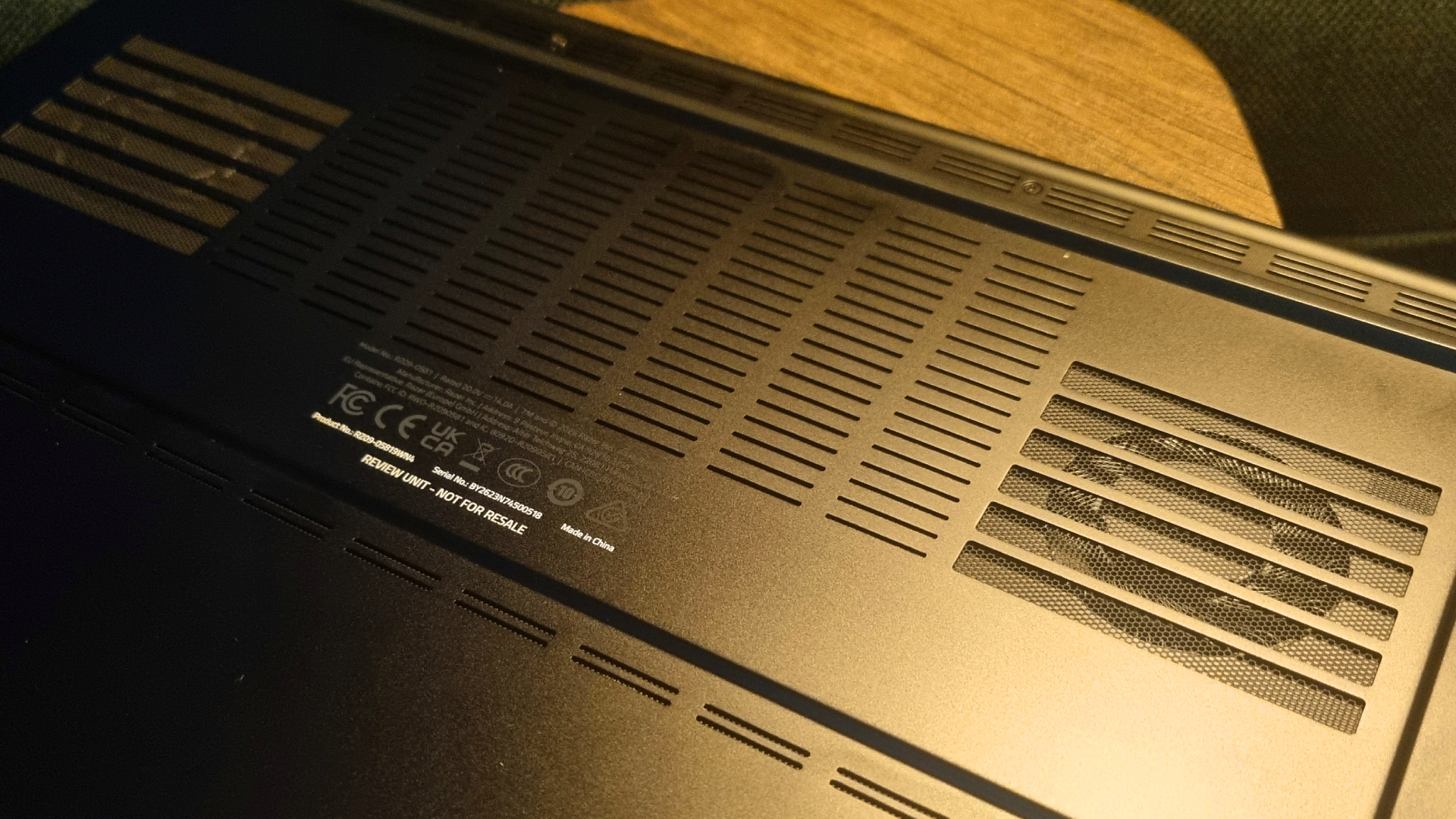 The backside of a Razer Blade 16 (2026) gaming laptop, showing the rear fan exhausts