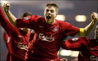 Gerrard celebrates a stunning trademark strike against Olympiakos in 2004, which sealed Liverpool's place in the Champions League knockout stage