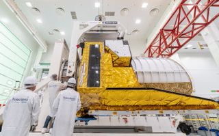 Technicians at a Thales Alenia Space facility in France prep the European Space Agency's Euclid space telescope for its coming sea voyage to its Florida launch site. Euclid is scheduled to launch atop a SpaceX Falcon 9 rocket in July 2023. 