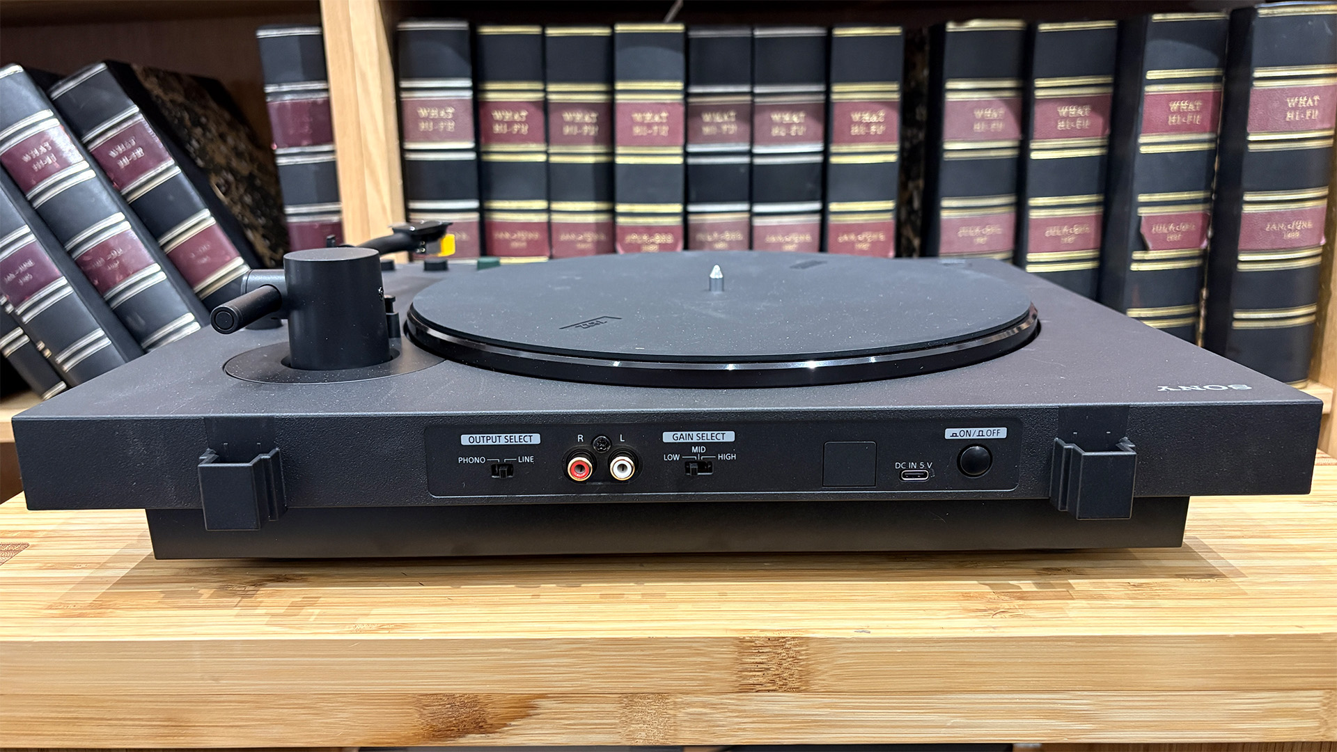 Sony PS-LX5BT Bluetooth turntable on hi-fi rack, showing rear connections