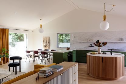 open plan kitchen with modern fluted round island
