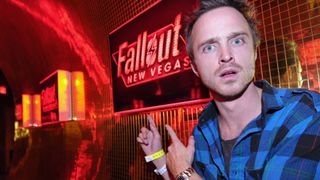 Aaron Paul pointing at a Fallout sign at a Fallout New Vegas launch event in 2010