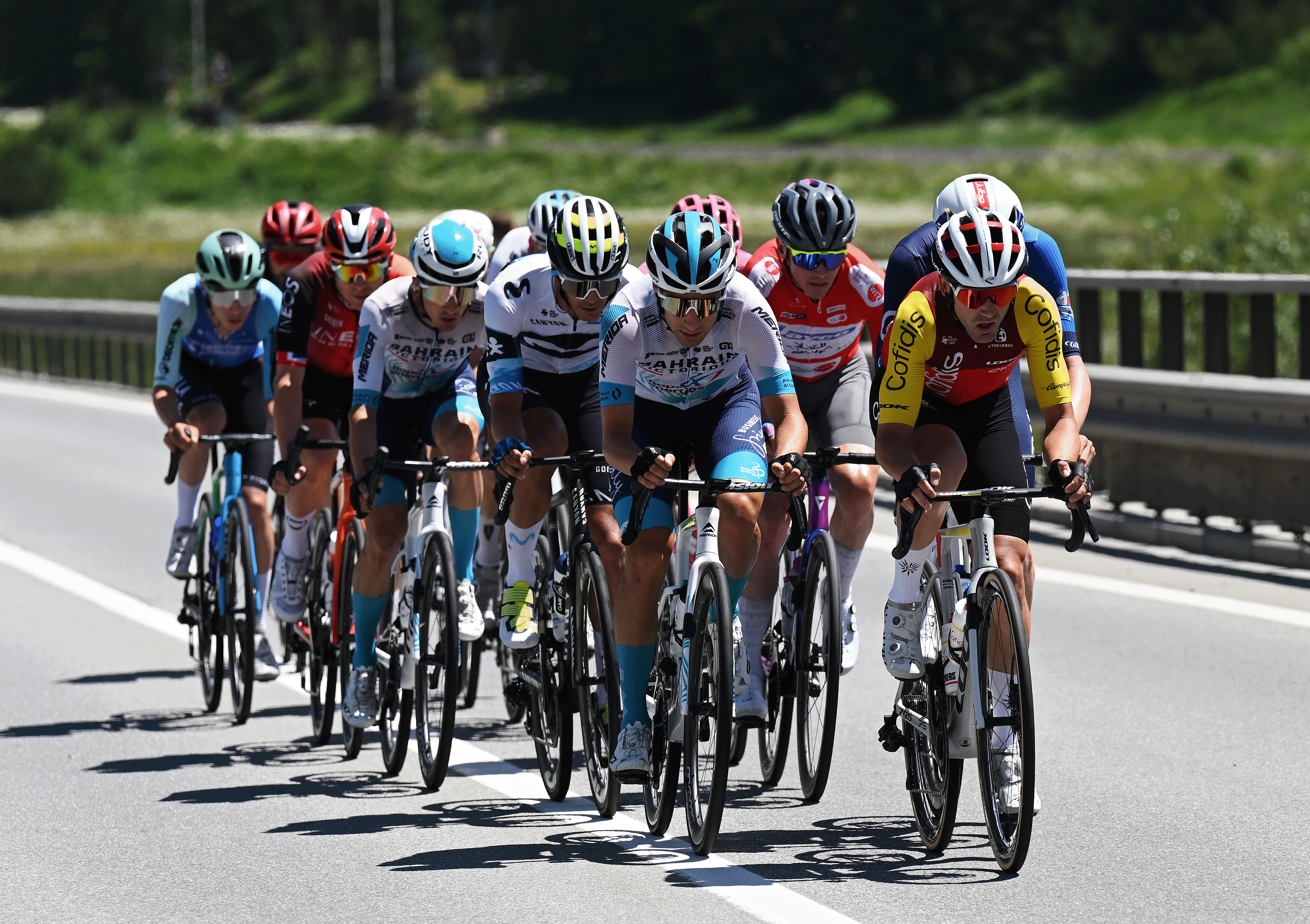 SANTA MARIA IN CALANCA, SWITZERLAND - JUNE 19: (L-R) Javier Romo of Spain and Team Movistar, Nicolo Buratti of Italy and Team Bahrain - Victorious, Felix Engelhardt of Germany and Team Jayco AlUla - Red Mountain Jersey and Ion Izagirre of Spain and Team Cofidis compete in the breakaway during the 88th Tour de Suisse, Stage 5 a 183.8km stage from La Punt to Santa Maria in Calanca 941m / #UCIWT / on June 19, 2025 in Santa Maria in Calanca, Switzerland. (Photo by Tim de Waele/Getty Images)