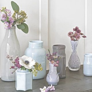 glass vases and flowers in it