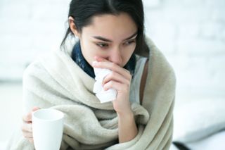 A woman with a cold.