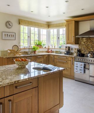 kitchen with wooden cabinet and granite counter