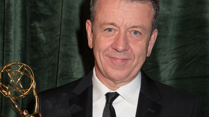 Peter Morgan accepts the award for outstanding Writing For A Drama Series for The Crown attends the Netflix celebration of the 73rd Emmy Awards at 180 The Strand on September 19, 2021 in London, England.