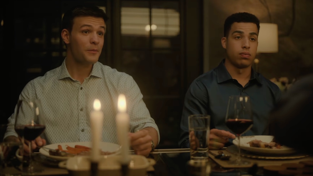 Sean Reagan (Mika Amonsen) and (Jonah Silver) Marcus Scribnersit at the dinner table on Boston Blue.