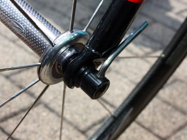 A tiny lever secures the wheels on to the frame and fork.