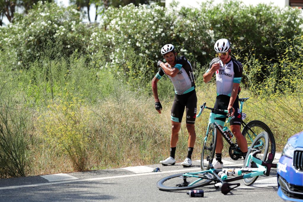 ALTO DE LA MONTAA DE CULLERA SPAIN AUGUST 19 Robert Stannard of Australia and Andrey Zeits of Kazahkstan and Team BikeExchange involved in a crash during the 76th Tour of Spain 2021 Stage 6 a 1583km stage from Requena to Alto de la Montaa de Cullera 184m lavuelta LaVuelta21 on August 19 2021 in Alto de la Montaa de Cullera Spain Photo by Gonzalo Arroyo MorenoGetty Images