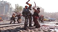 A soldier in heavy armor swings a blade at an armored enemy on a cobblestone street in front of a damaged building with a vintage police car nearby.