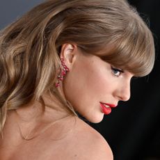 Taylor Swift wearing a dress that could have gone to the 2025 met gala