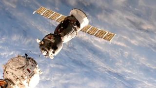 A Russian Soyuz MS-23 space capsule carrying NASA astronaut Frank Rubio and Russian cosmonauts Sergey Prokopyev and Dmitri Petelin moves to a new docking port at the International Space Station on April 6, 2023 with the blue Earth behind.