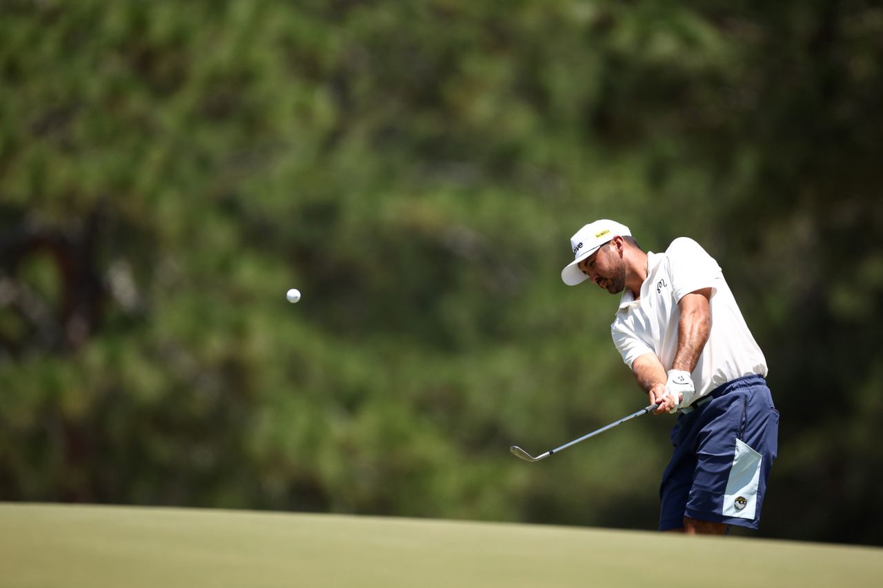 Jason Day hits a chip shot during a practice round of the 2024 US Open
