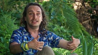 Danny Kilby wearing a blue button down shirt in a confessional in Survivor 51 episode 1.