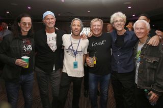 Geddy Lee and Alex Lifeson with Chad Smith, Taylor Hawkins, The Police's Stewart Copeland and Robby Kreiger of The Doors