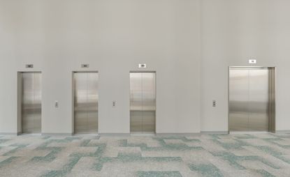 ‘Avery Singer: Free Fall’ at Hauser & Wirth, London: a lobby-like corporate set with row of lifts