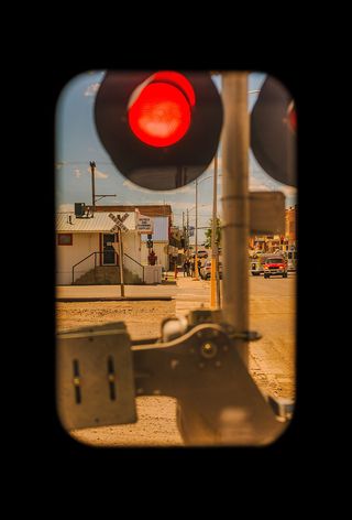 Photograph of a rail crossing in Cut Bank, Montana, taken by photographer Katie Edwards as part of her Portrait of America project