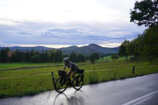 Anna cycling after a heavy shower in Slovakia