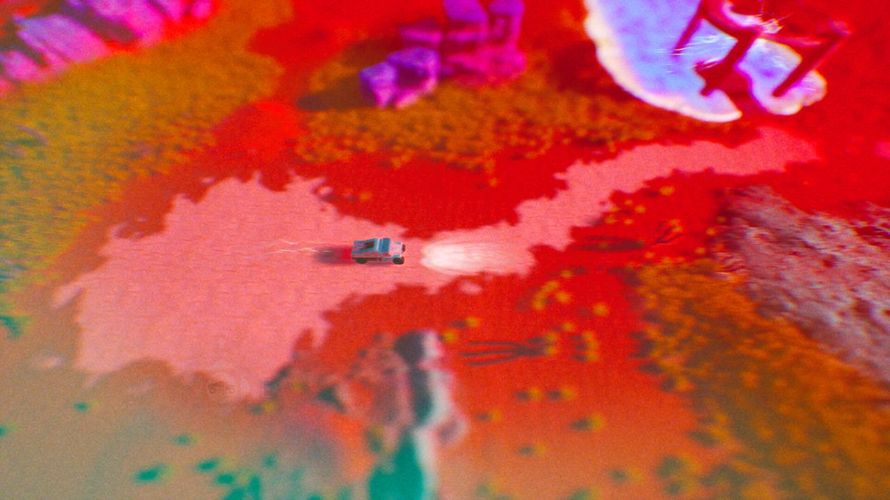 A red-and-blue tinged alien desert landscape with a vehicle racing through, in an isometric view, from game ADRIFT