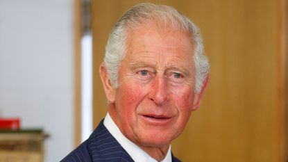 Prince Charles, Prince of Wales looks at products at Jodrell Laboratory at The Royal Botanic Gardens