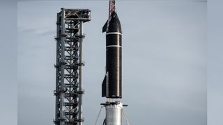 SpaceX's first orbital Starship SN20 is stacked atop its massive Super Heavy Booster 4 for the first time on Aug. 6, 2021 at the company's Starbase facility near Boca Chica Village in South Texas. The duo stood 395 feet tall, taller than NASA's Saturn V moon rocket.