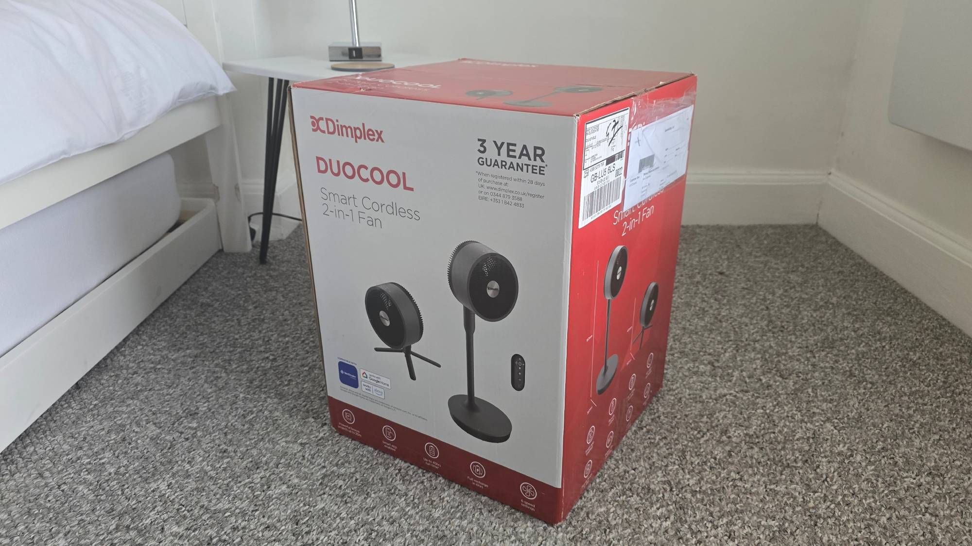 Dimplex DuoCool Smart Cordless 2-in-1 Fan in box on floor