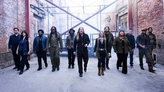 Tedeschi Trucks Band walking down an alley