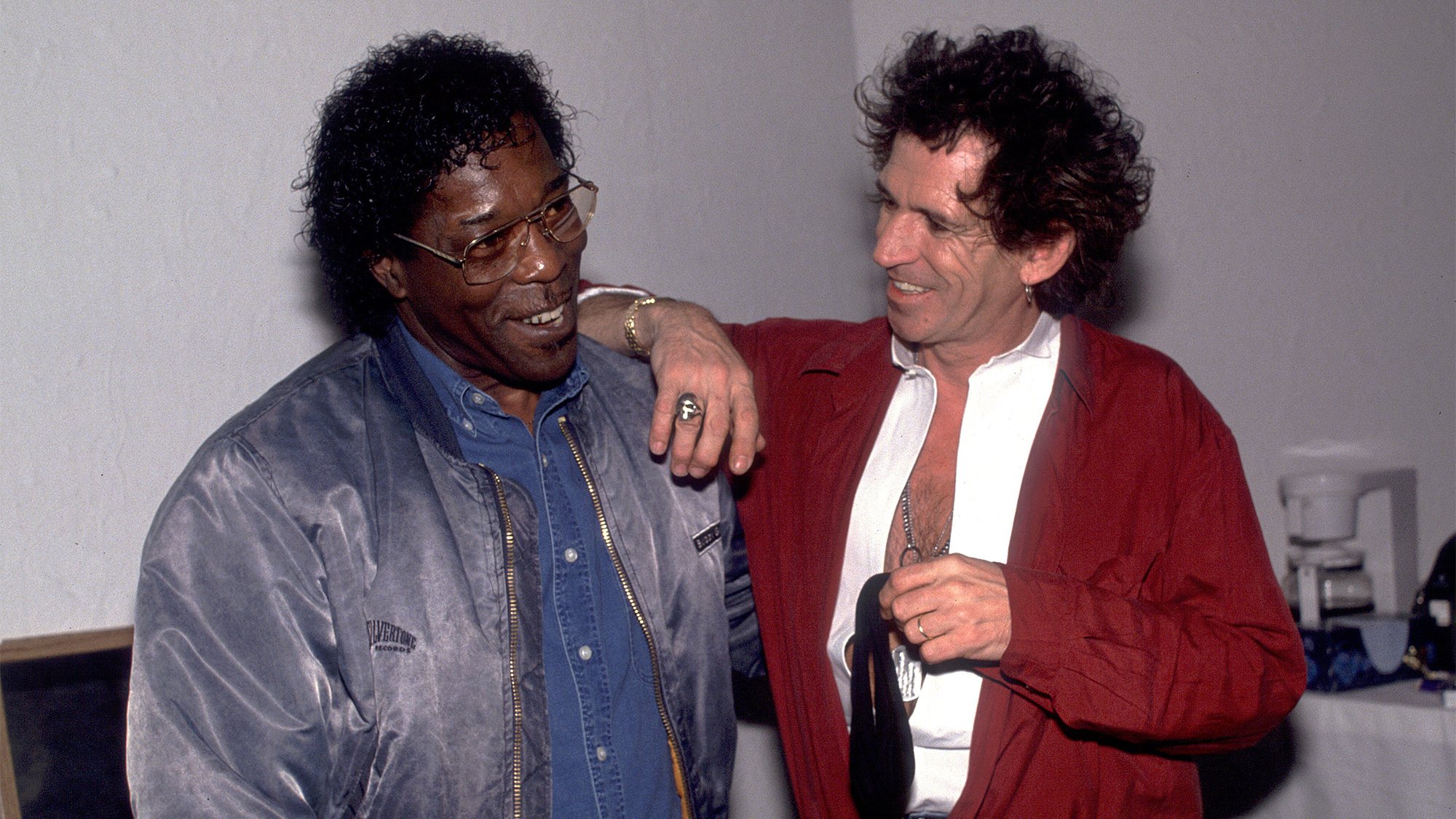 British musician Keith Richards (right) backstage American musician Buddy Guy on the former's 'Main Offender' tour, early 1993.