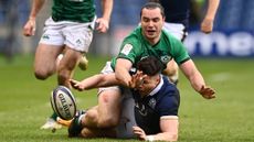 Ireland wing James Lowe and Scotland wing Sean Maitland compete for a loose ball during the Guinness Six Nations match between Scotland and Ireland
