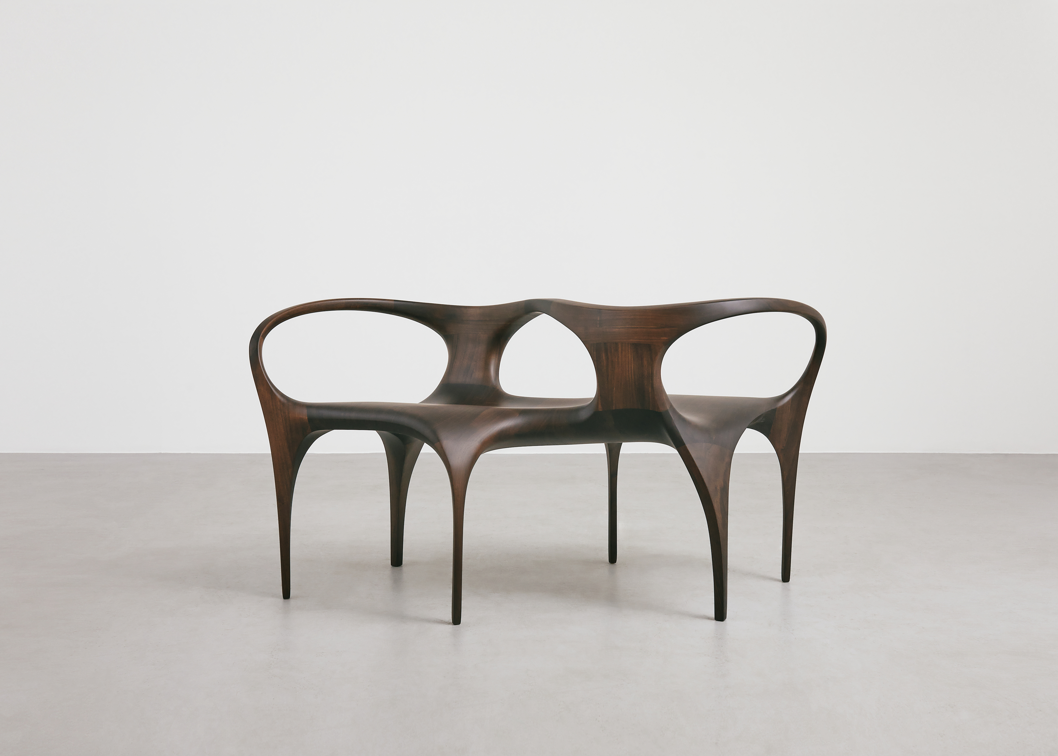 Wooden bench by Zaha Hadid Design at TEFAF