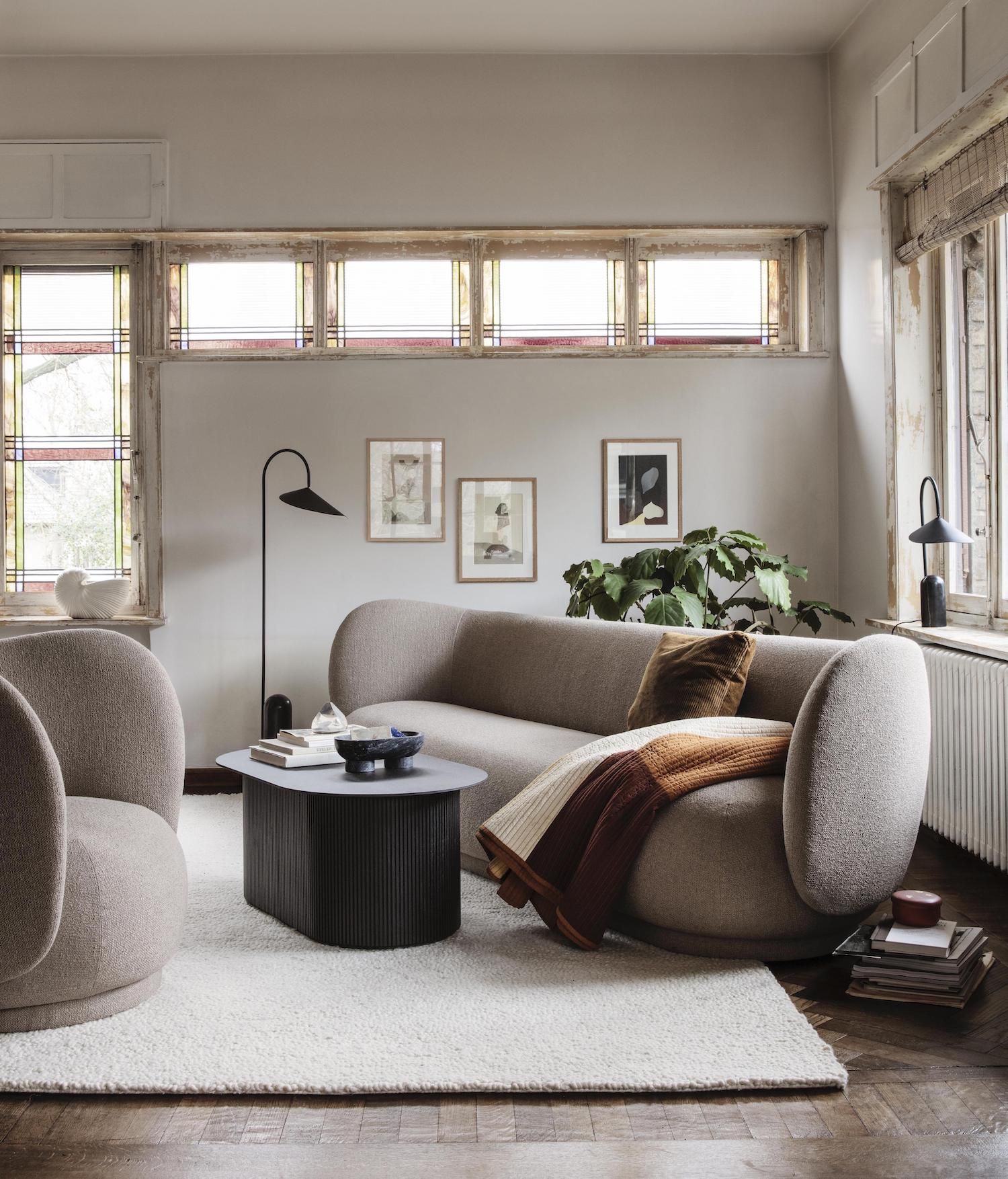 Small living room with curved sofa