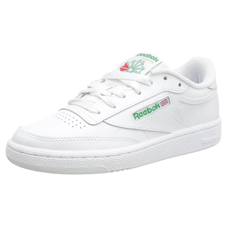 white trainers with green writing