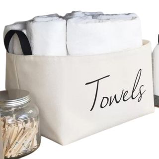 White towel storage basket
