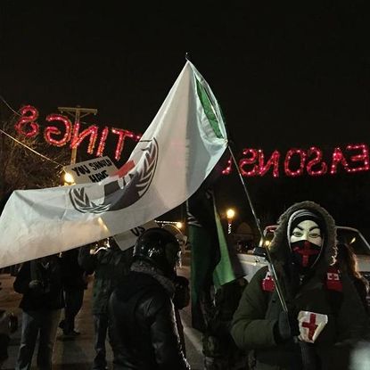 Protestors gather before Ferguson grand jury announcement