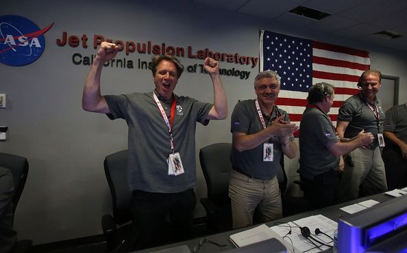 Excited scientists react to Juno entering Jupiter&amp;#039;s orbit.