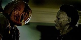 Michael Myers looking at a body